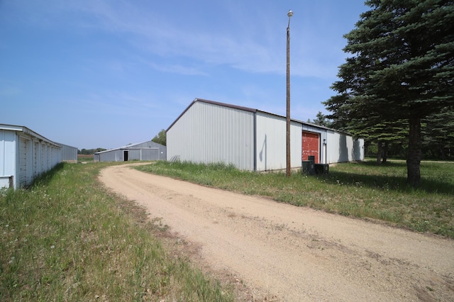 exterior space featuring a pole building