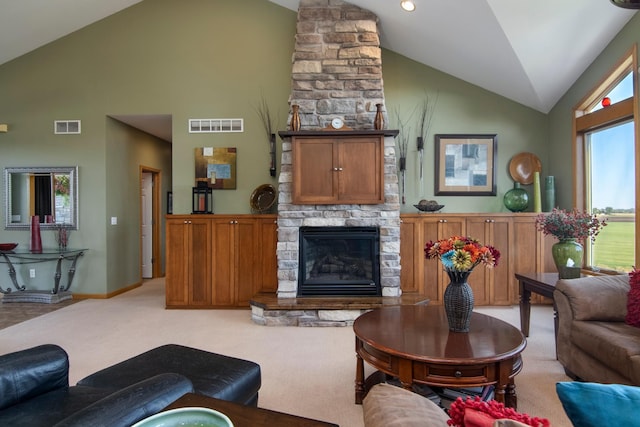 living area with light carpet, a stone fireplace, visible vents, and baseboards