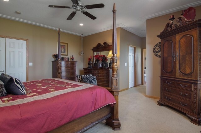 bedroom featuring light carpet, ceiling fan, baseboards, and crown molding