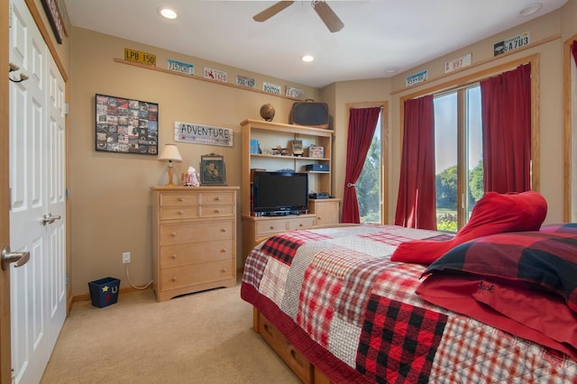 bedroom featuring recessed lighting, a ceiling fan, and light colored carpet