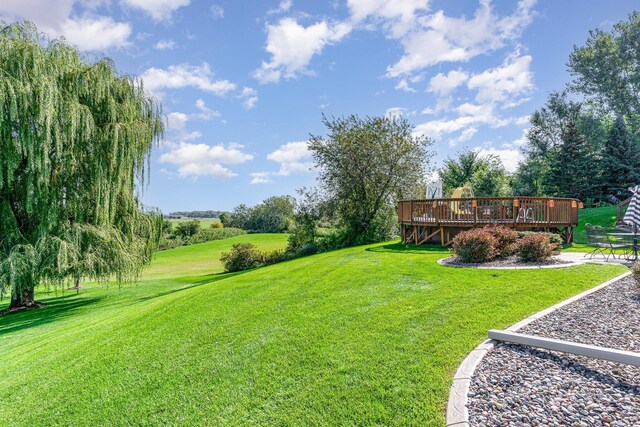 view of yard with a wooden deck