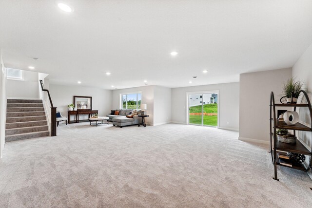 14355 Acer Ave, Rosemount, MN 55068 - carpeted living area with recessed lighting, stairs, and baseboards