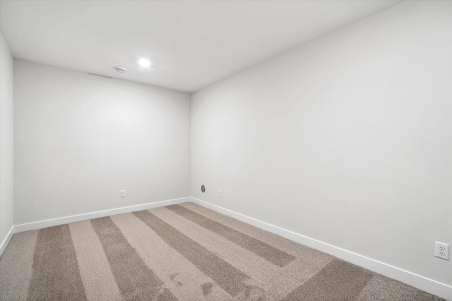 unfurnished room featuring carpet floors, recessed lighting, and baseboards