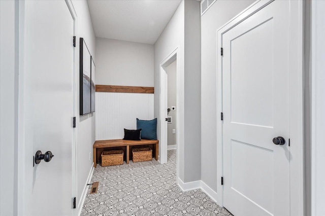 mudroom featuring visible vents and baseboards