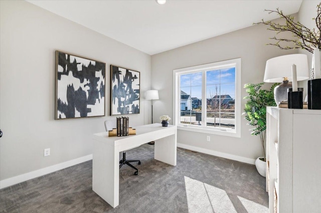 office area featuring carpet floors and baseboards