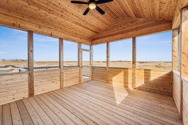 unfurnished sunroom with lofted ceiling, a sauna, wood ceiling, and a ceiling fan