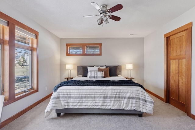 6 Black Lake Rd, North Oaks, MN 55127 - bedroom featuring light colored carpet, baseboards, and ceiling fan