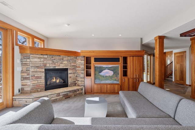 6 Black Lake Rd, North Oaks, MN 55127 - living room featuring a fireplace, carpet, decorative columns, stairs, and recessed lighting