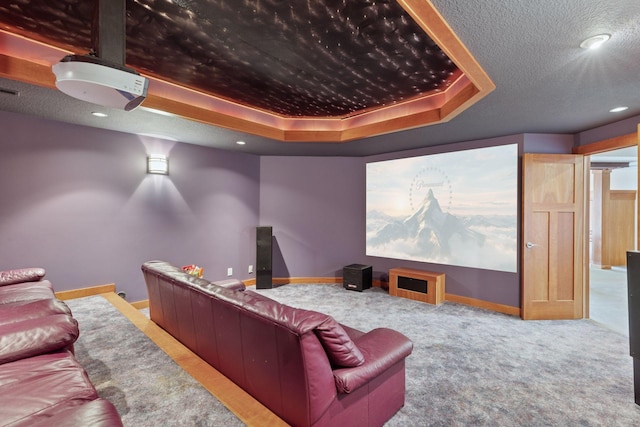 6 Black Lake Rd, North Oaks, MN 55127 - carpeted cinema with a raised ceiling, baseboards, and recessed lighting