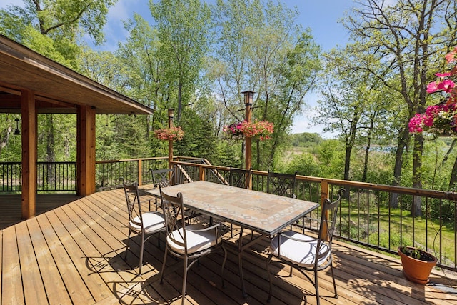 6 Black Lake Rd, North Oaks, MN 55127 - wooden deck with outdoor dining area