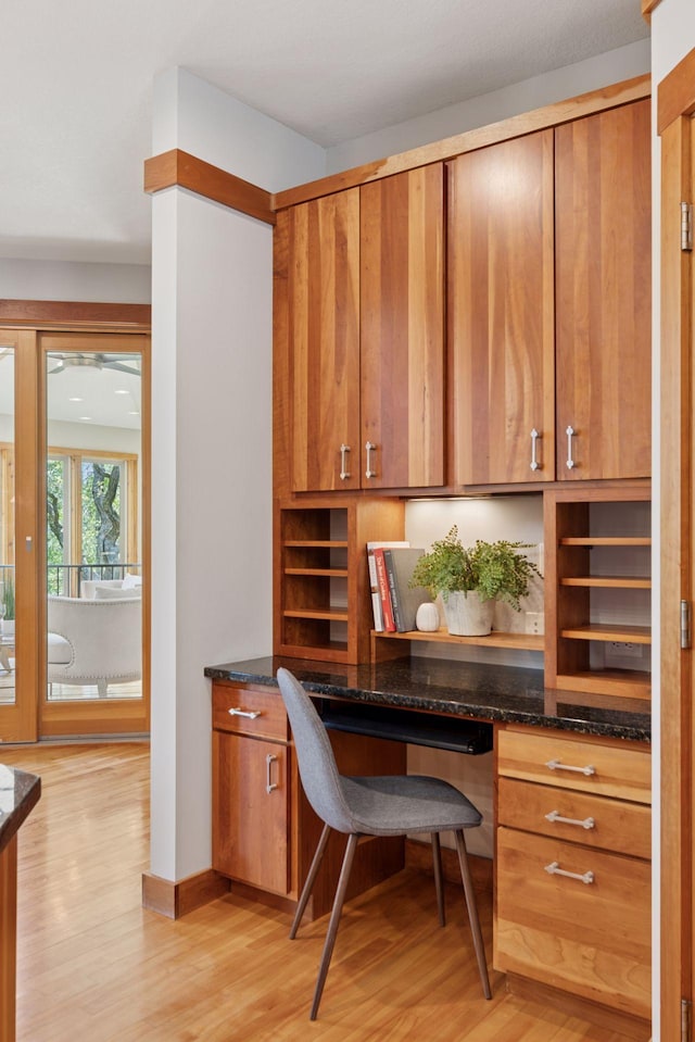 6 Black Lake Rd, North Oaks, MN 55127 - office area featuring built in desk, light wood-style flooring, and a ceiling fan