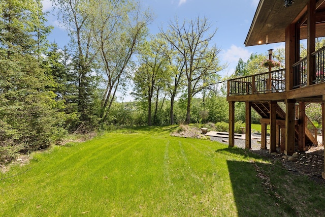 6 Black Lake Rd, North Oaks, MN 55127 - view of green lawn featuring a deck and stairway