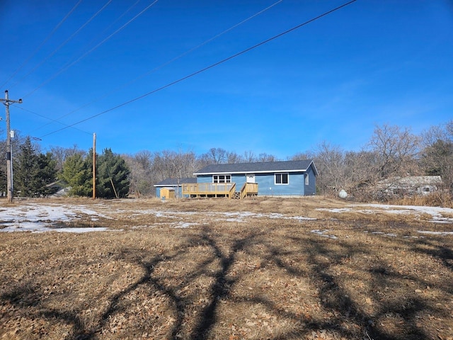 view of front of house with a deck