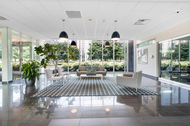 unfurnished sunroom featuring visible vents