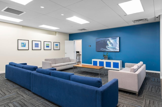 carpeted living room featuring recessed lighting, visible vents, and baseboards