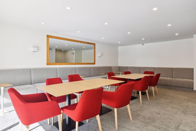 dining room with recessed lighting