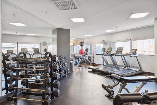 workout area with visible vents and baseboards