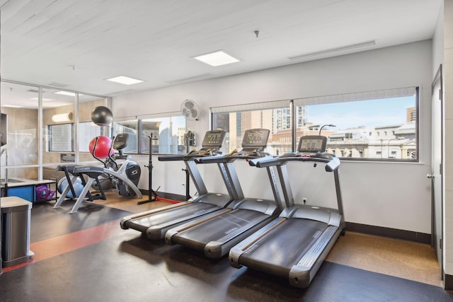 workout area featuring visible vents and baseboards