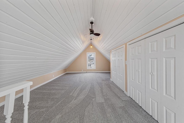 additional living space with lofted ceiling, carpet floors, and wooden ceiling