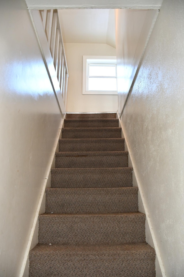 stairway with speckled floor