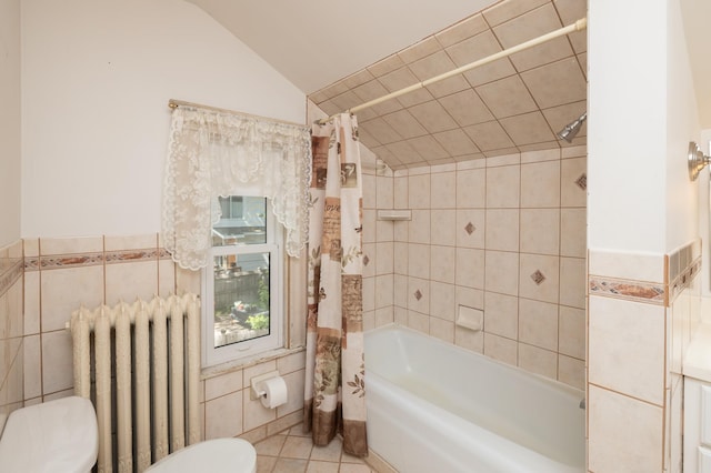 bathroom featuring tile walls, toilet, radiator heating unit, shower / tub combo, and tile patterned flooring