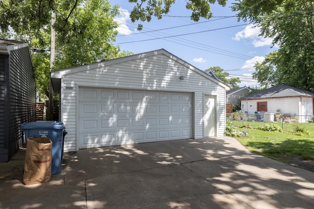 detached garage with fence