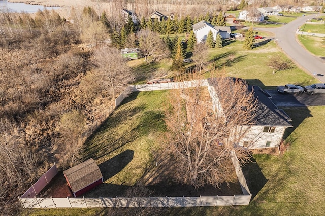 birds eye view of property with a residential view