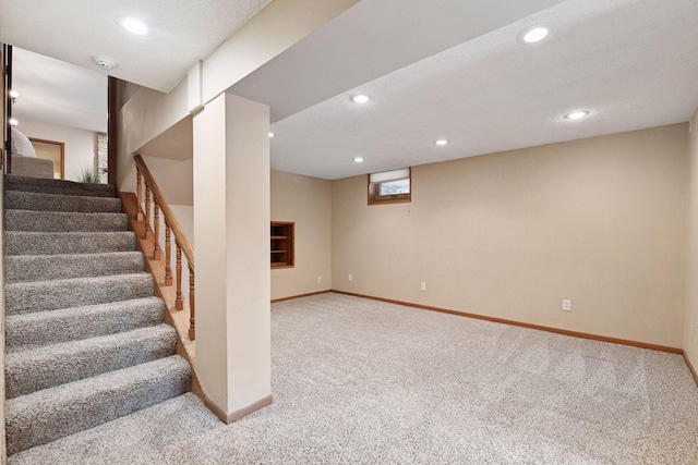 staircase featuring recessed lighting, baseboards, and carpet floors