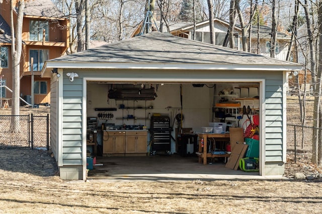 detached garage with fence