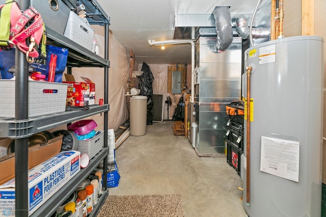 basement featuring water heater, heating unit, and electric panel