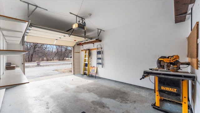 garage featuring a garage door opener