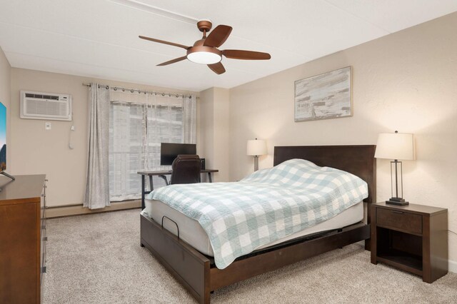 bedroom featuring ceiling fan, light colored carpet, and a wall mounted AC