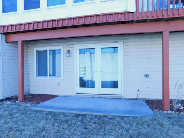 entrance to property with french doors and a patio