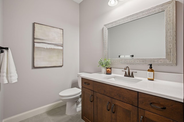 18928 Katrine Ct, Lakeville, MN 55044 - bathroom with vanity, toilet, and baseboards