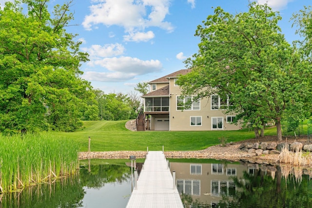 18928 Katrine Ct, Lakeville, MN 55044 - dock area featuring stairs, a water view, and a lawn