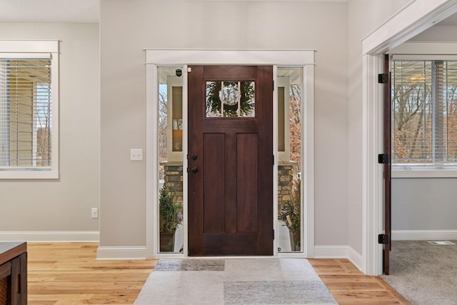 18928 Katrine Ct, Lakeville, MN 55044 - entryway featuring baseboards and light wood finished floors
