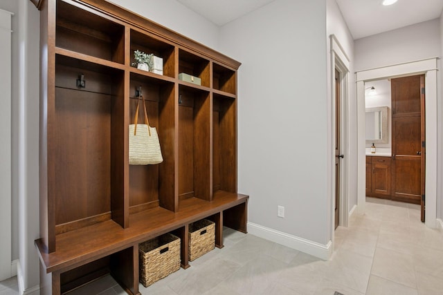 18928 Katrine Ct, Lakeville, MN 55044 - mudroom featuring baseboards, light tile patterned floors, and recessed lighting
