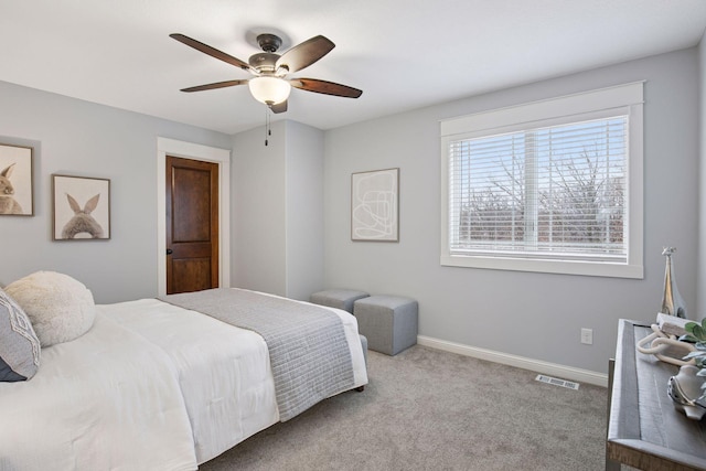 18928 Katrine Ct, Lakeville, MN 55044 - carpeted bedroom featuring baseboards and a ceiling fan