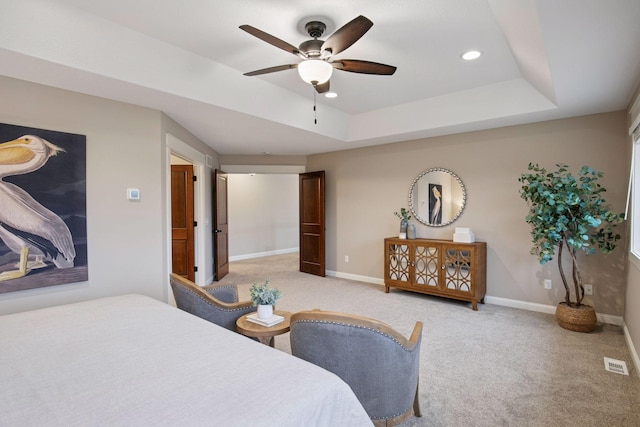 18928 Katrine Ct, Lakeville, MN 55044 - bedroom with carpet flooring, baseboards, a raised ceiling, recessed lighting, and a ceiling fan