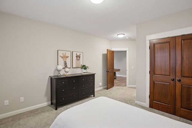 18928 Katrine Ct, Lakeville, MN 55044 - bedroom with light colored carpet, baseboards, and a closet