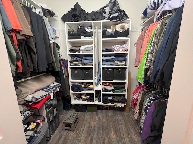 spacious closet with wood finished floors