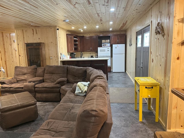 living room with dark carpet, wood walls, wooden ceiling, and recessed lighting