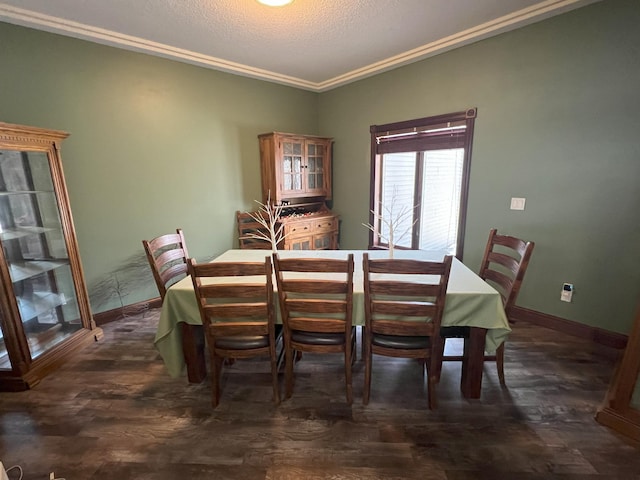 dining area with crown molding, a textured ceiling, and baseboards