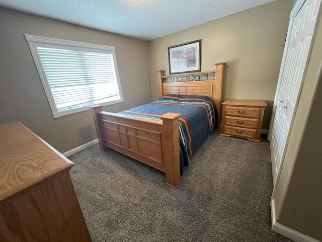 11999 Lake Maud Trl, Lake Eunice Twp, MN 56511 - bedroom with a textured ceiling, baseboards, and dark carpet