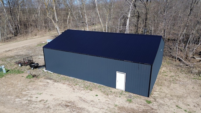 11999 Lake Maud Trl, Lake Eunice Twp, MN 56511 - view of outdoor structure featuring an outdoor structure and a wooded view