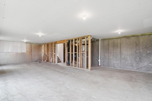 unfinished basement with stairs