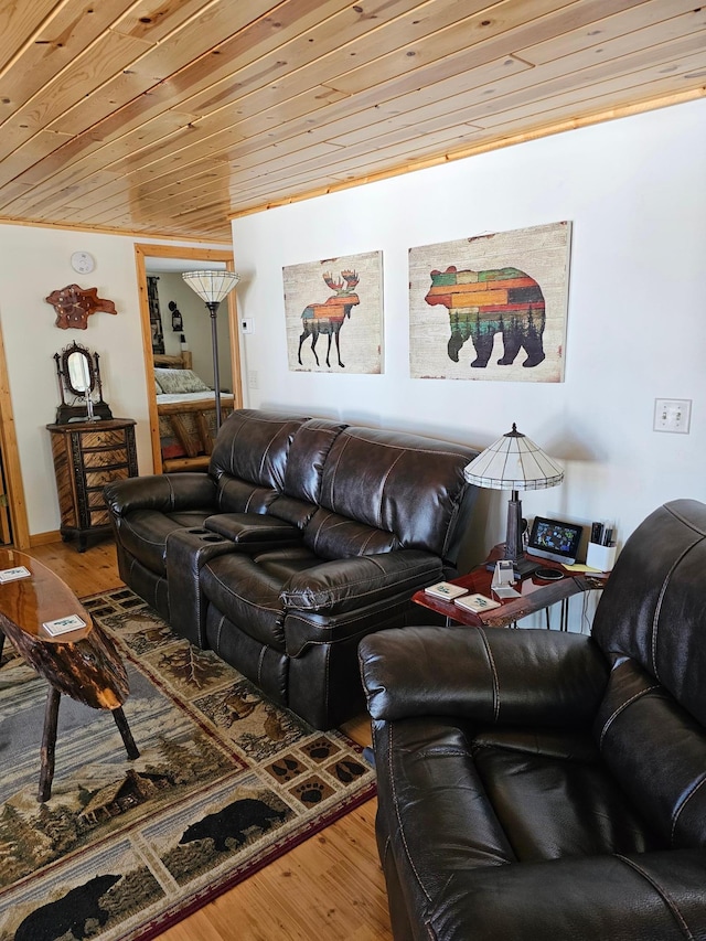 living room with wooden ceiling and wood finished floors