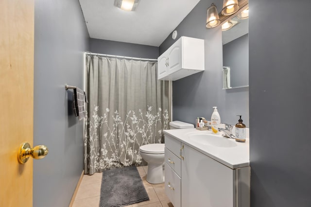 full bath featuring curtained shower, vanity, toilet, and tile patterned floors