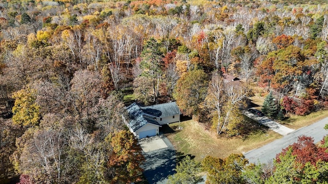 bird's eye view featuring a forest view