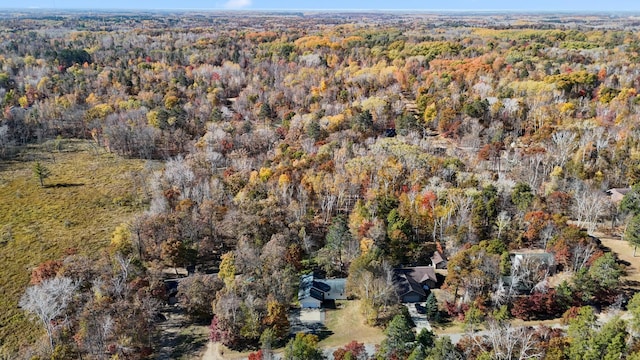 drone / aerial view featuring a view of trees